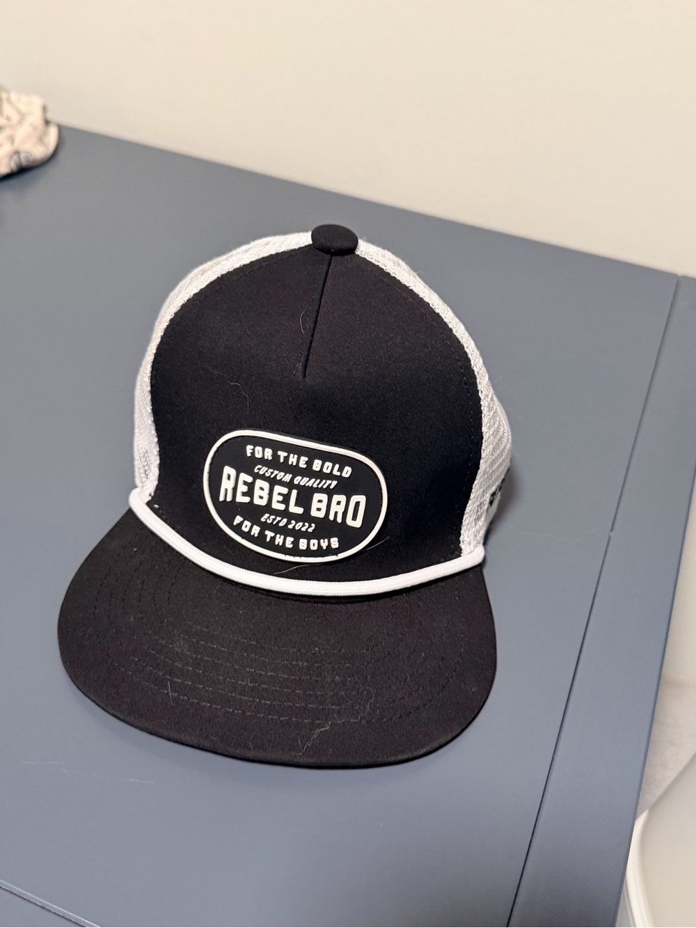 Newborn Rebel Bro Trucker Hat
